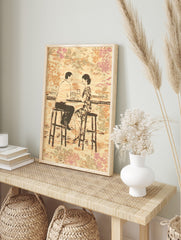 Illustrative print of a couple at a bar, holding drinks, against a wood-grain and floral, in an alternate framed mockup