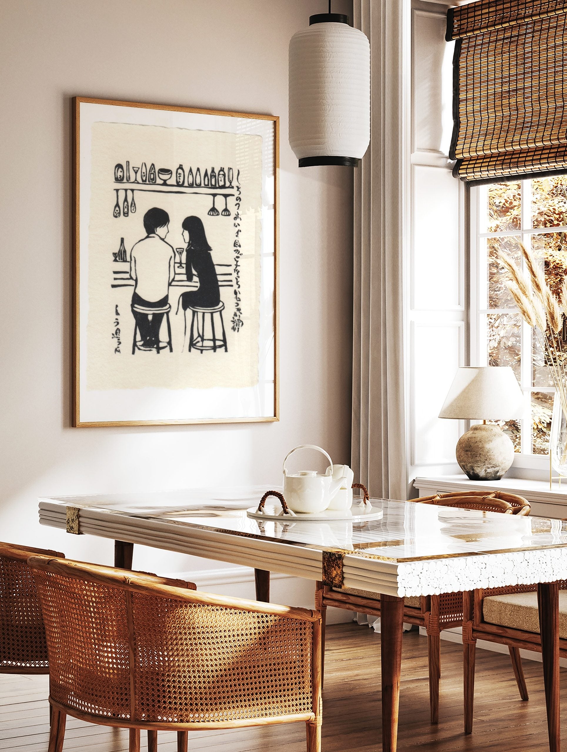 Monochrome illustration of a couple at a bar with bottles, glasses, and Japanese text on a cream, in a styled room mockup