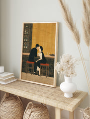 Illustrative print of a couple at a bar, leaning in close, with bottles on shelves and warm, in an alternate framed mockup