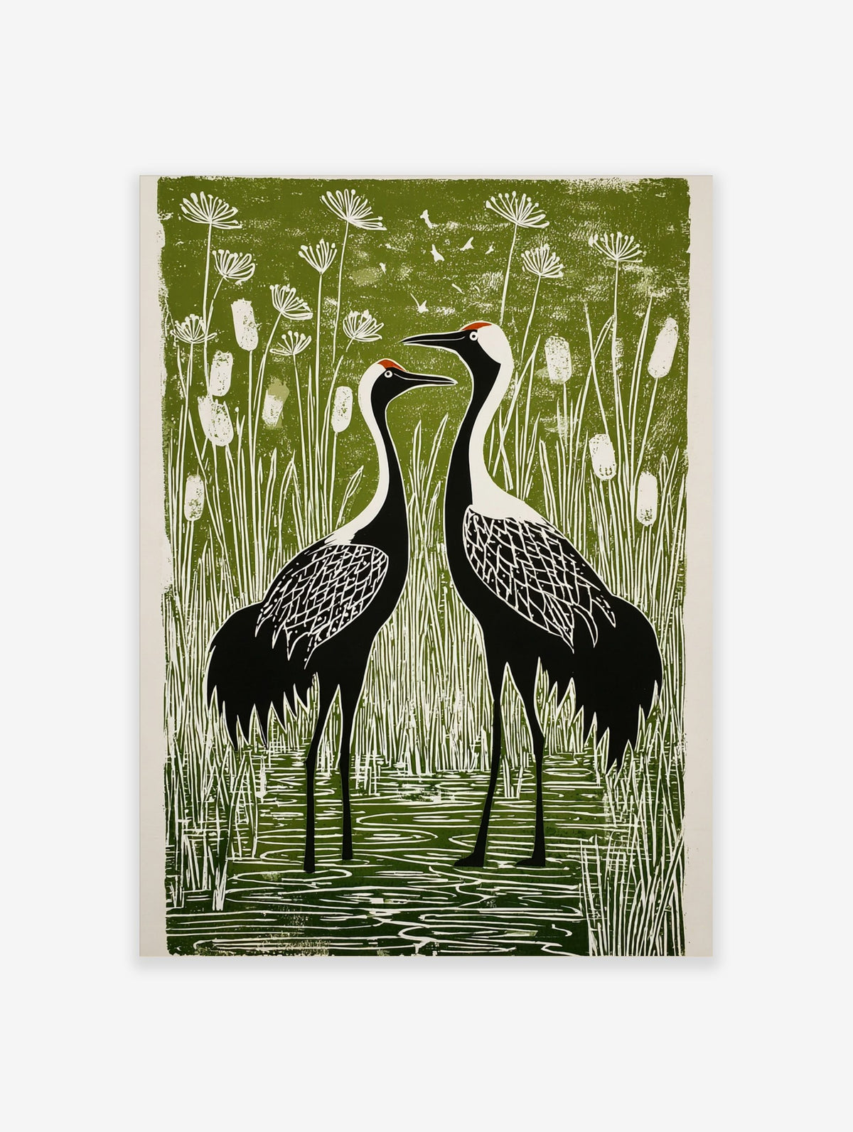 Linocut style print of two black and white crane birds with red crowns in a green marsh with cattails