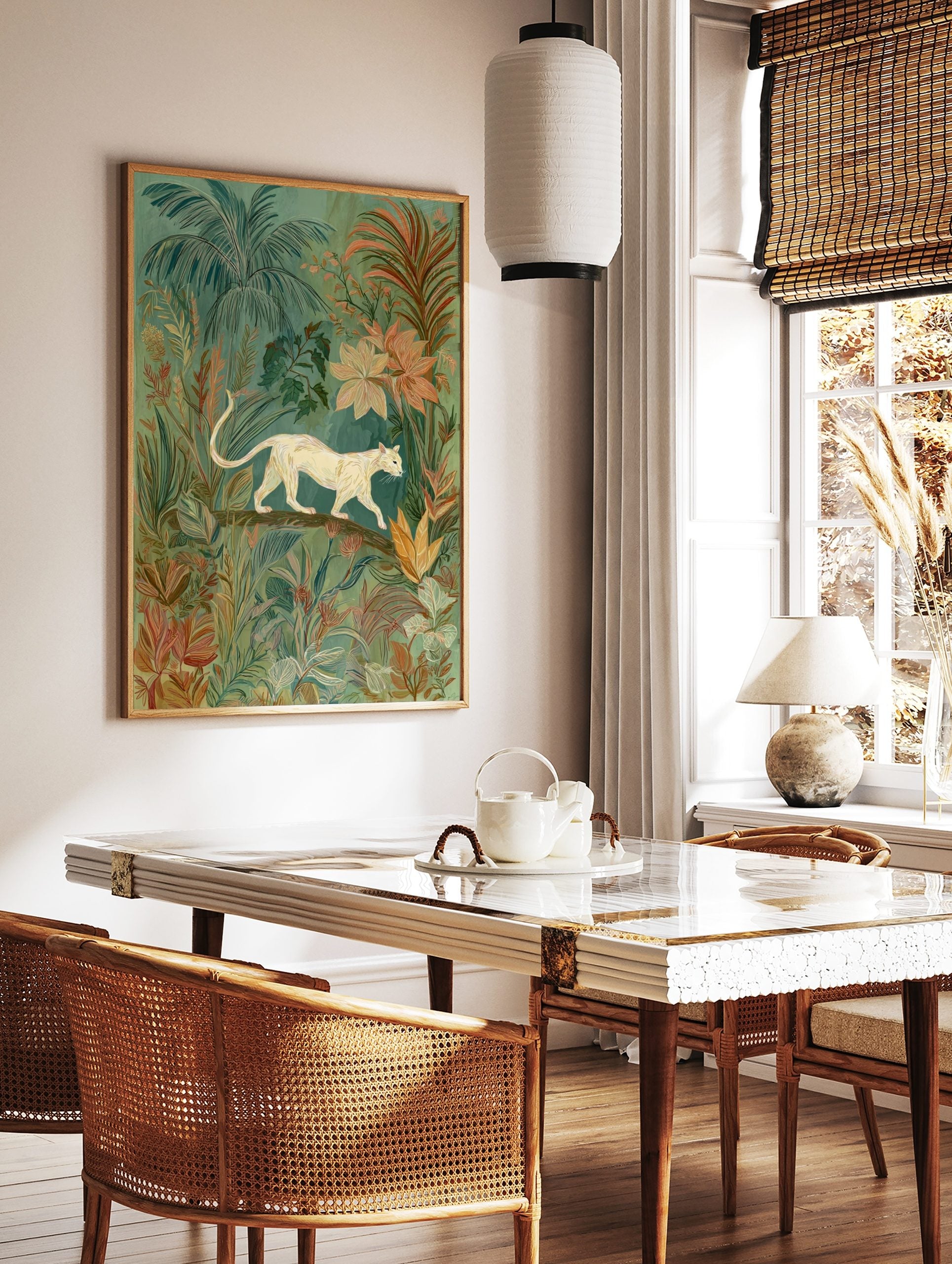 Illustrative wall art of a cream big cat walking on a branch amidst lush green and peach tropical, in a styled room mockup