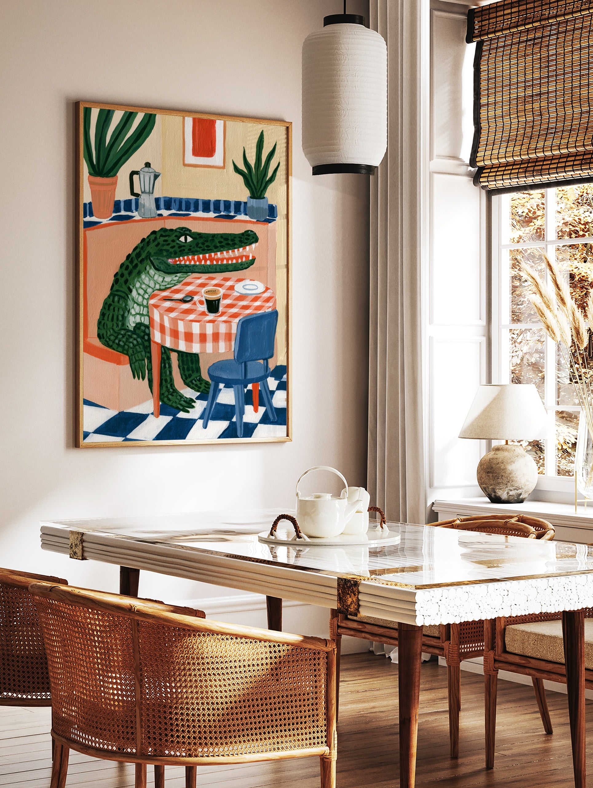 Green crocodile sitting at a table with coffee and a moka pot, illustrative style wall art print, in a styled room mockup