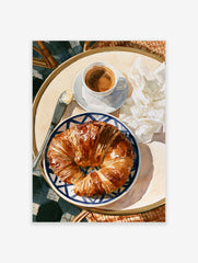 Watercolour illustration of a croissant and coffee on a blue and white plate, perfect for kitchen wall art