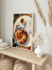 Watercolour illustration of a croissant and coffee on a blue and white plate, perfect for, in an alternate framed mockup