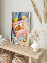 Croissant breakfast poster with a golden croissant in a pink box, fresh lemon, and a bowl of oats on a table. - Image 4