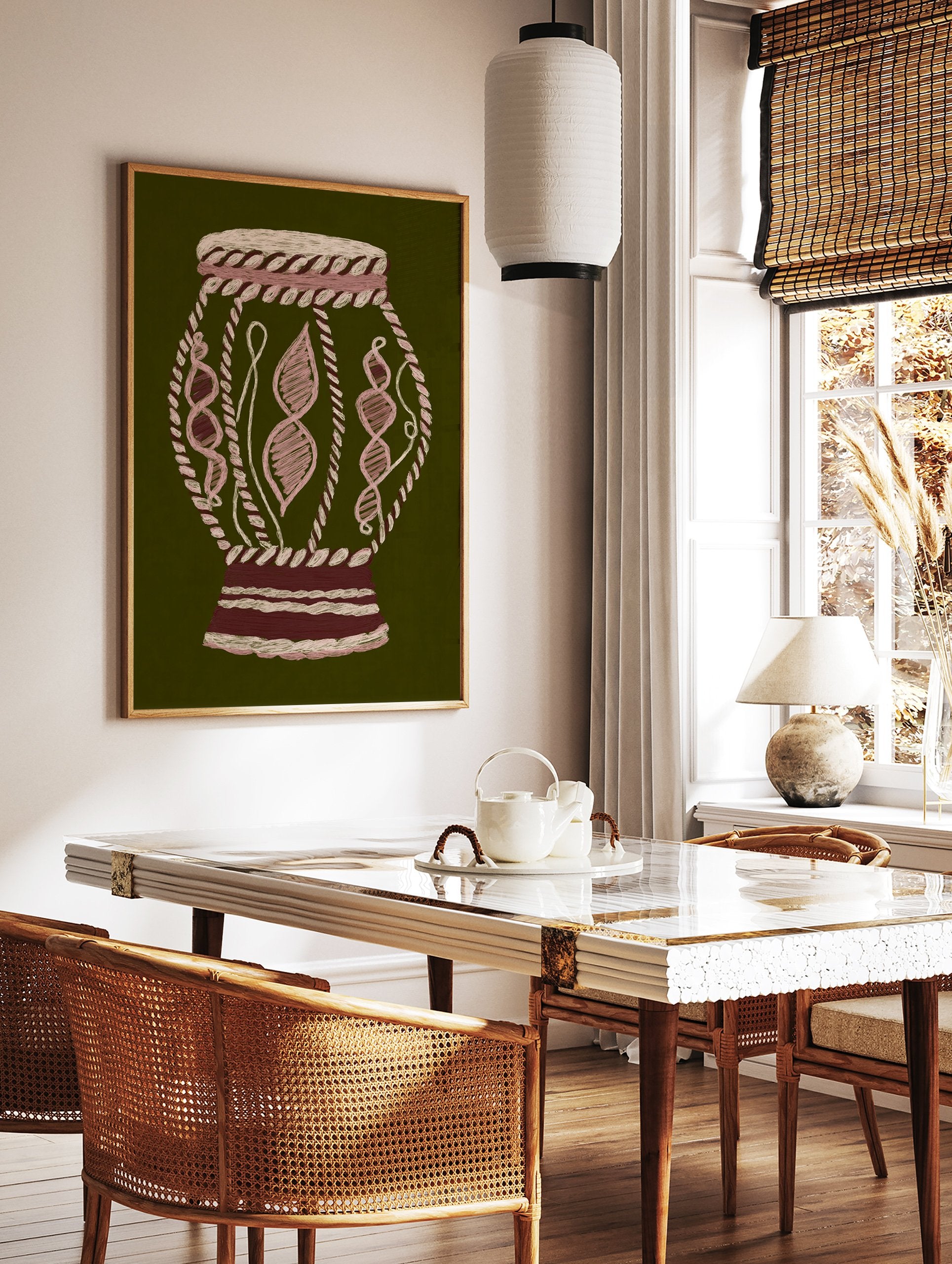 Abstract cultural wall art print of an embroidered-style vessel in pink, beige, and dark red on a dark green background. - Image 2