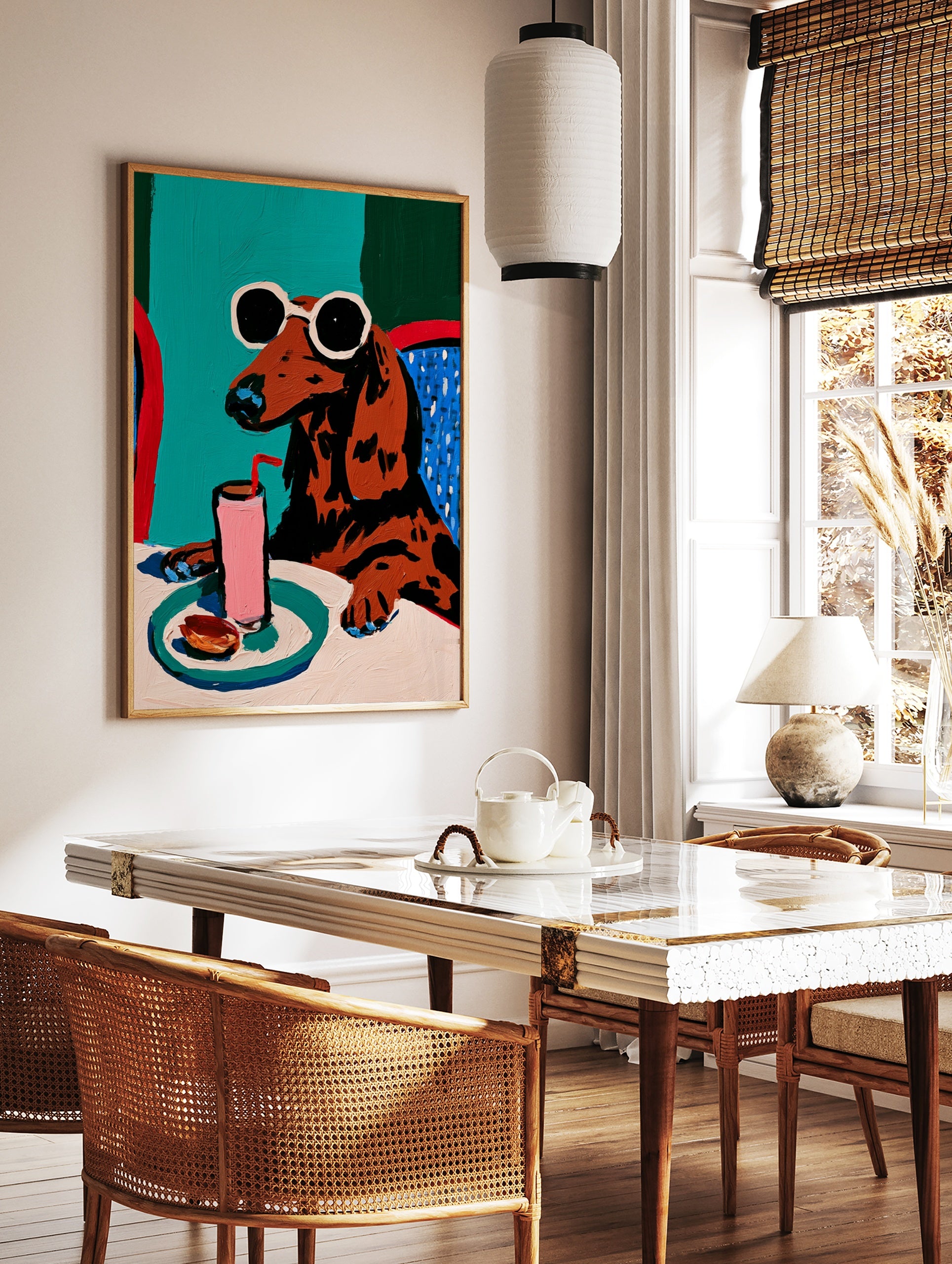 Illustration of a brown dachshund with sunglasses drinking a pink beverage at a table, colourful, in a styled room mockup