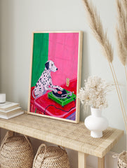 Illustrative print of a Dalmatian dog DJing on a green turntable against a pink and green wall, in an alternate framed mockup