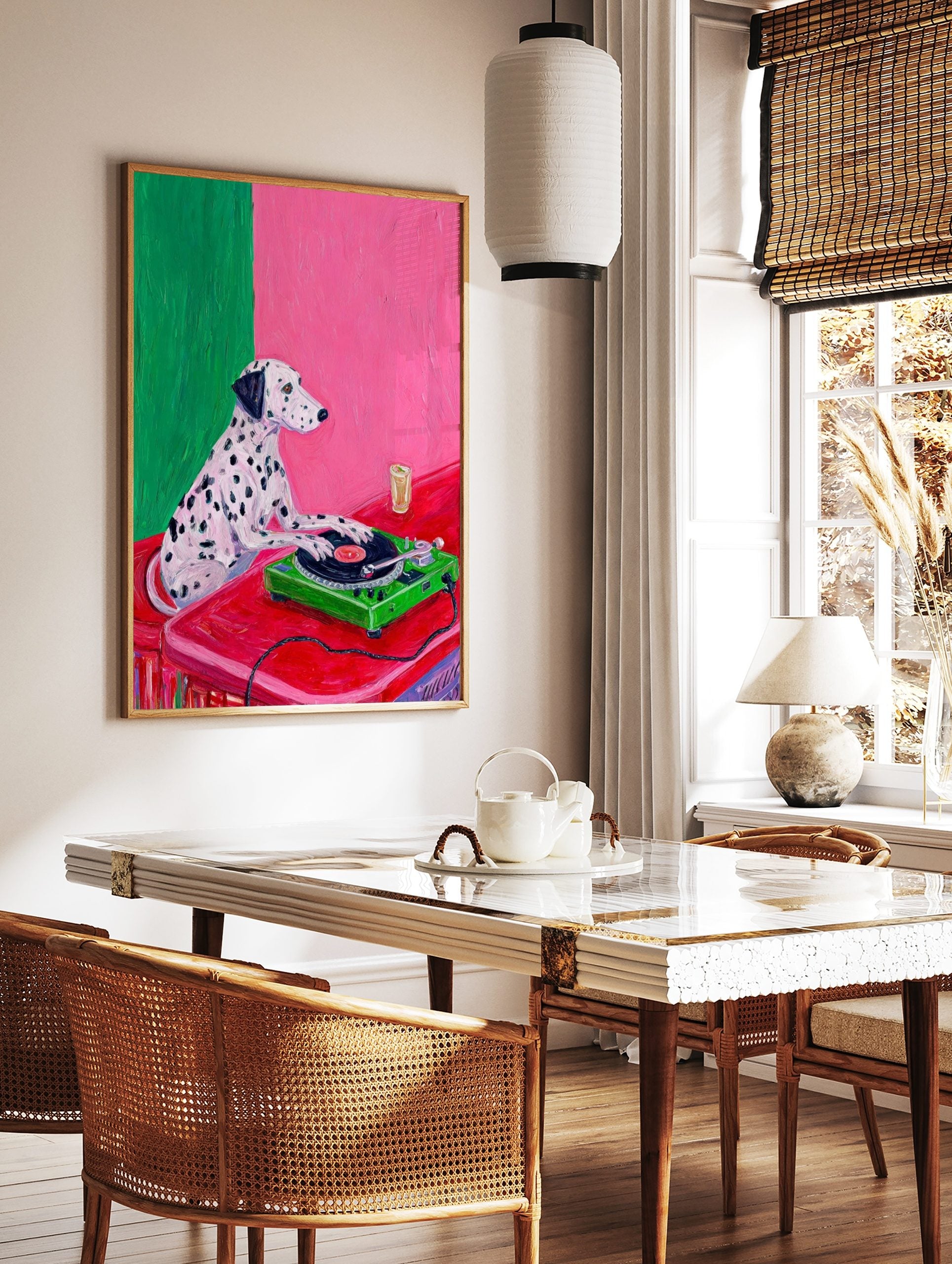 Illustrative print of a Dalmatian dog DJing on a green turntable against a pink and green wall, in a styled room mockup