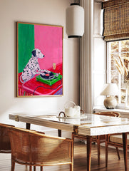 Illustrative print of a Dalmatian dog DJing on a green turntable against a pink and green wall, in a styled room mockup