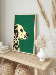 Stylised Dalmatian dog illustration art print with black spots on cream against a green, in an alternate framed mockup
