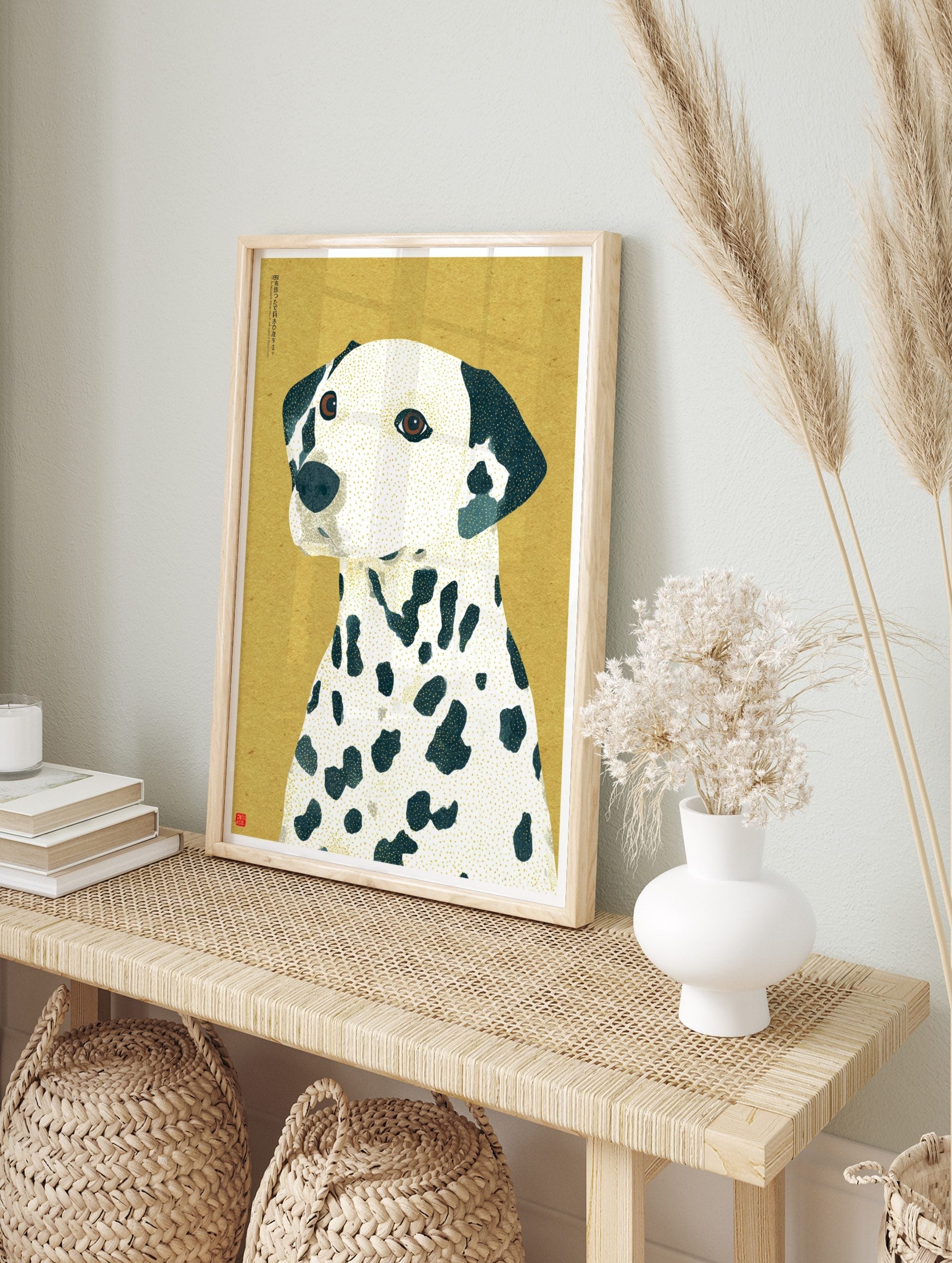 Illustrative Dalmatian dog art print with navy spots and gold texture on a golden-yellow, in an alternate framed mockup