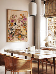 Illustrative art print of two Dalmatian dogs playing chess with a colourful floral background, in a styled room mockup