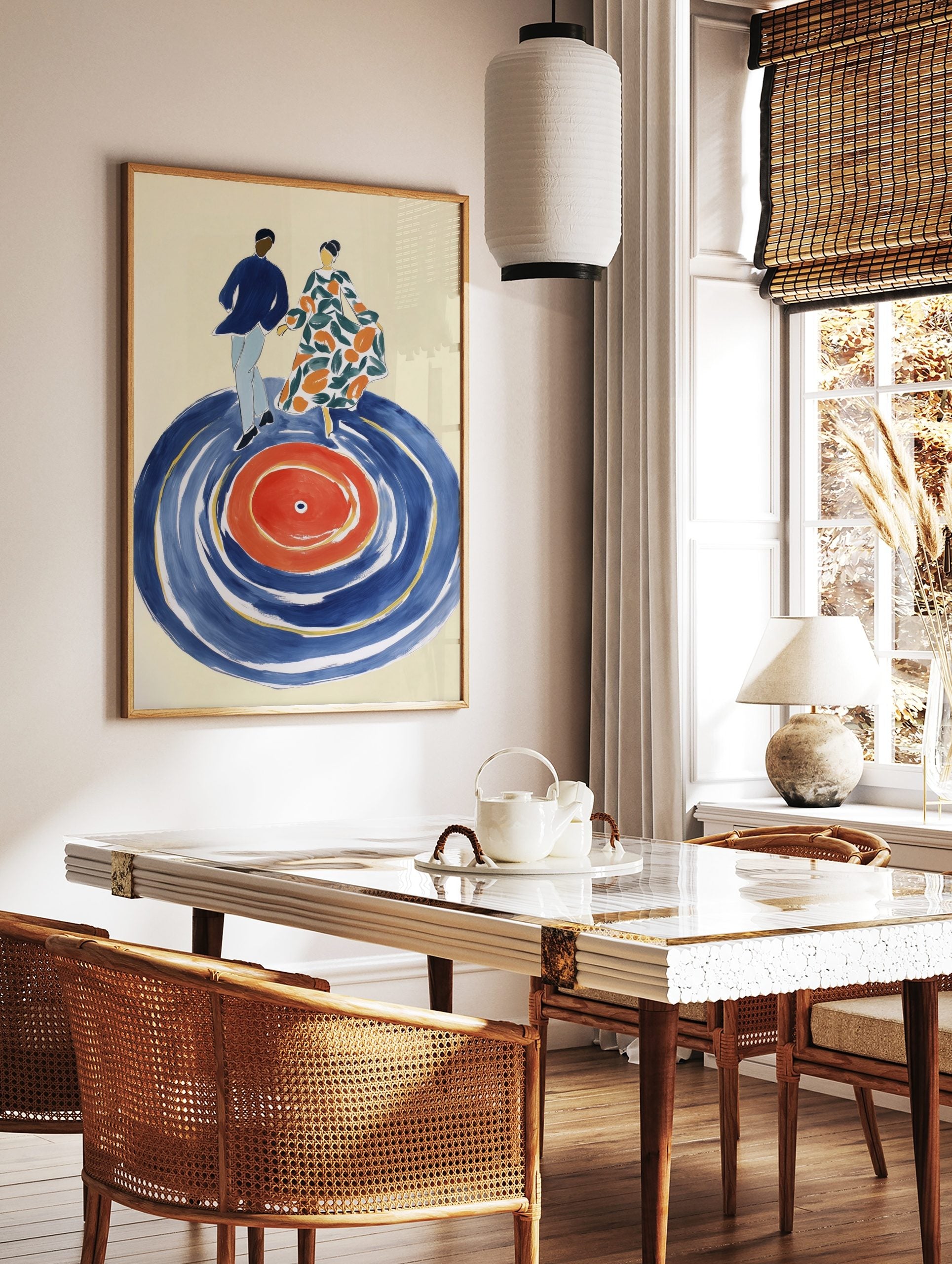 Illustrative art print of a dancing couple on a large blue and red vinyl record with green and, in a styled room mockup