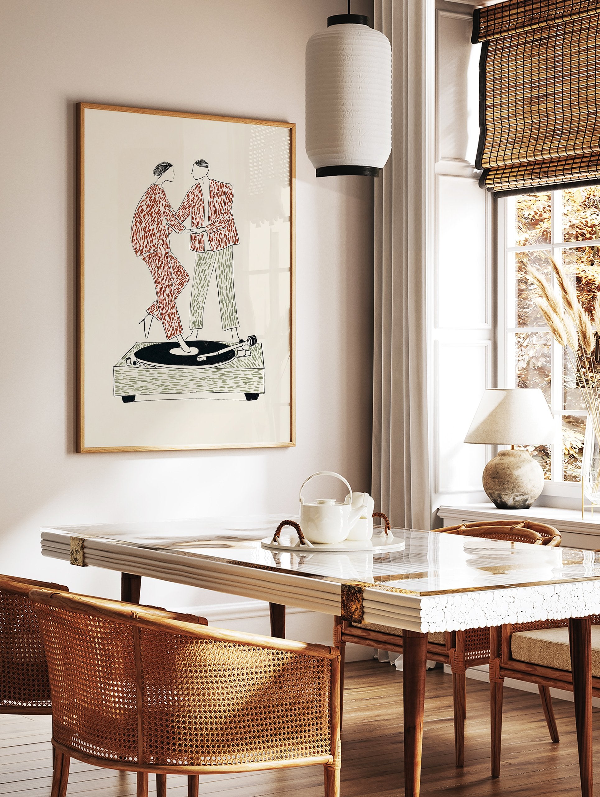 Illustrative Wall Art of a couple in patterned clothes dancing on a record player, set against a cream background. - Image 3