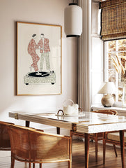 Illustrative Wall Art of a couple in patterned clothes dancing on a record player, set against a cream background. - Image 3