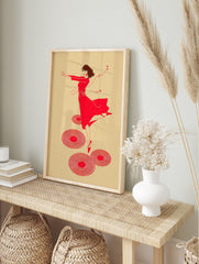 Red illustrative print of a dancing woman with headphones and musical notes, surrounded by, in an alternate framed mockup