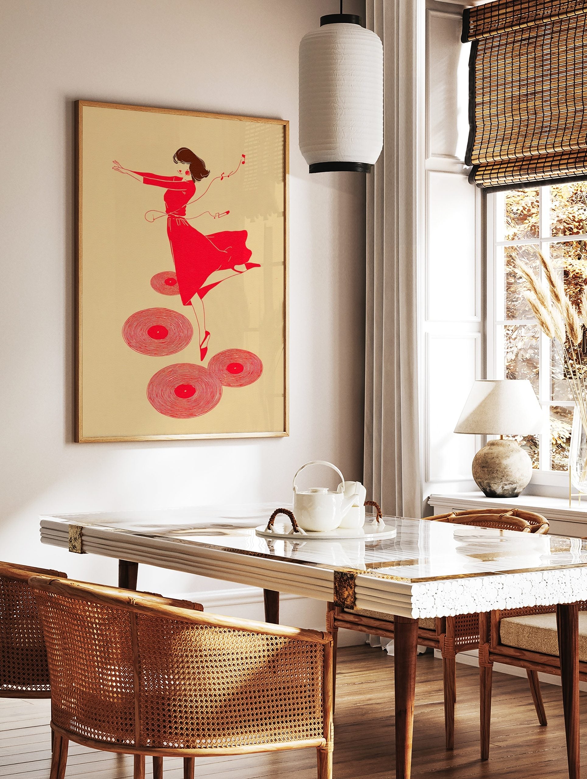 Red illustrative print of a dancing woman with headphones and musical notes, surrounded by vinyl, in a styled room mockup