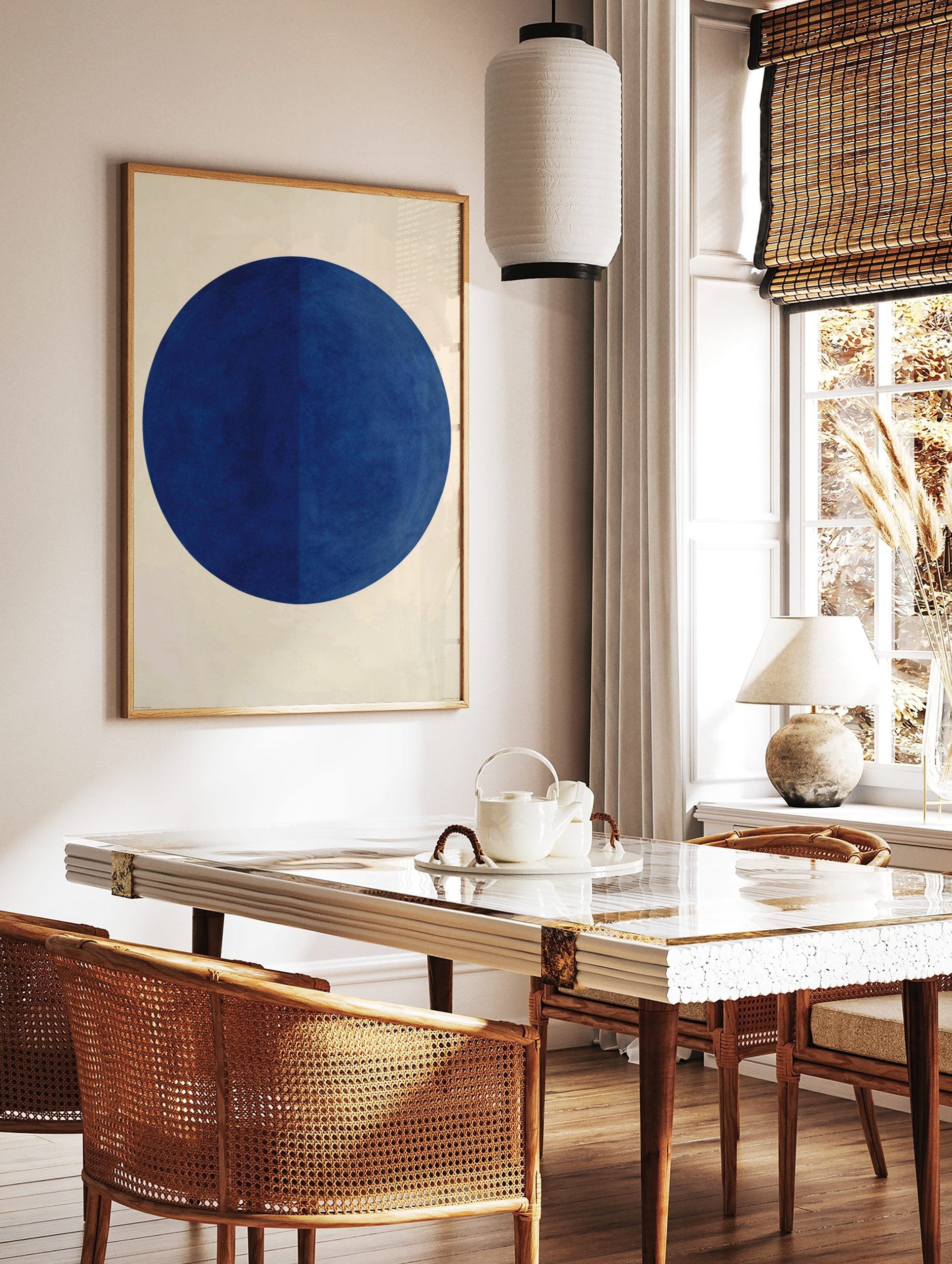 Minimalist dark blue circle geometric wall art print on an off-white background with subtle, in a styled room mockup
