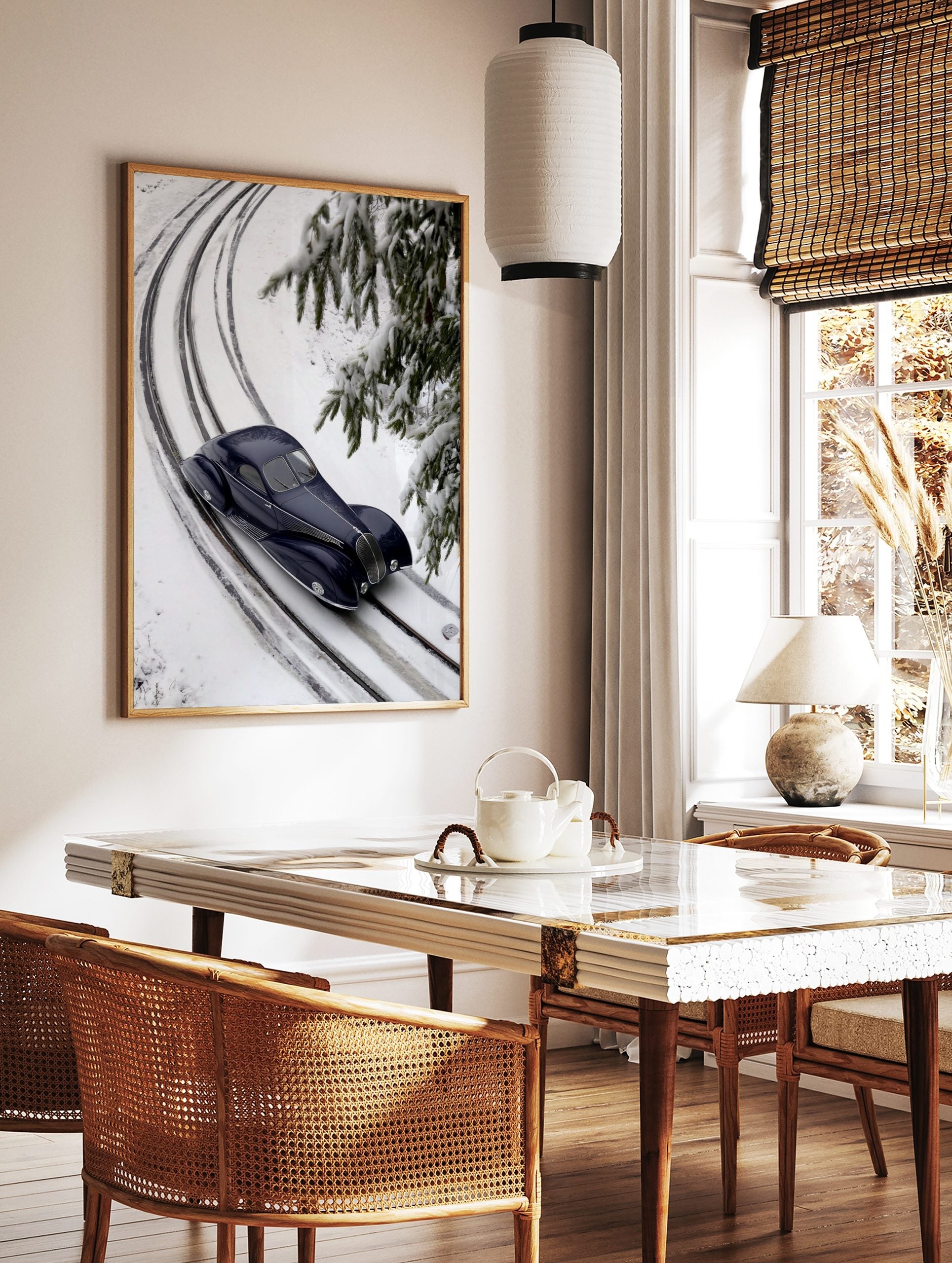 Dark blue vintage streamlined car on snow-covered railway tracks with fir branches in winter, in a styled room mockup