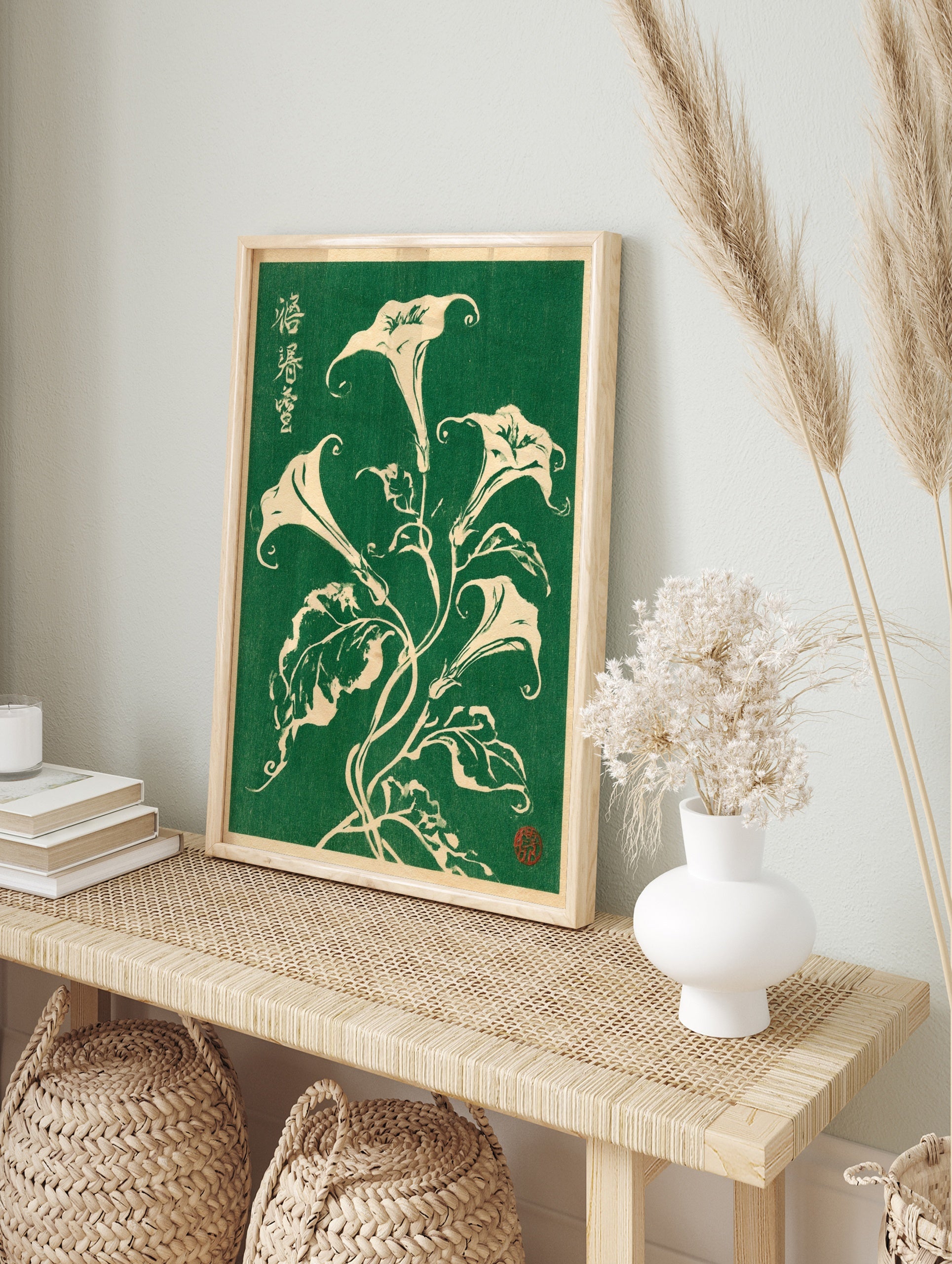 Botanical illustration of white Datura flowers with Japanese calligraphy on a deep green, in an alternate framed mockup