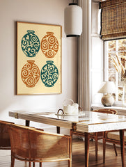 Four decorative round vases in teal and orange with swirling botanical patterns on a light, in a styled room mockup