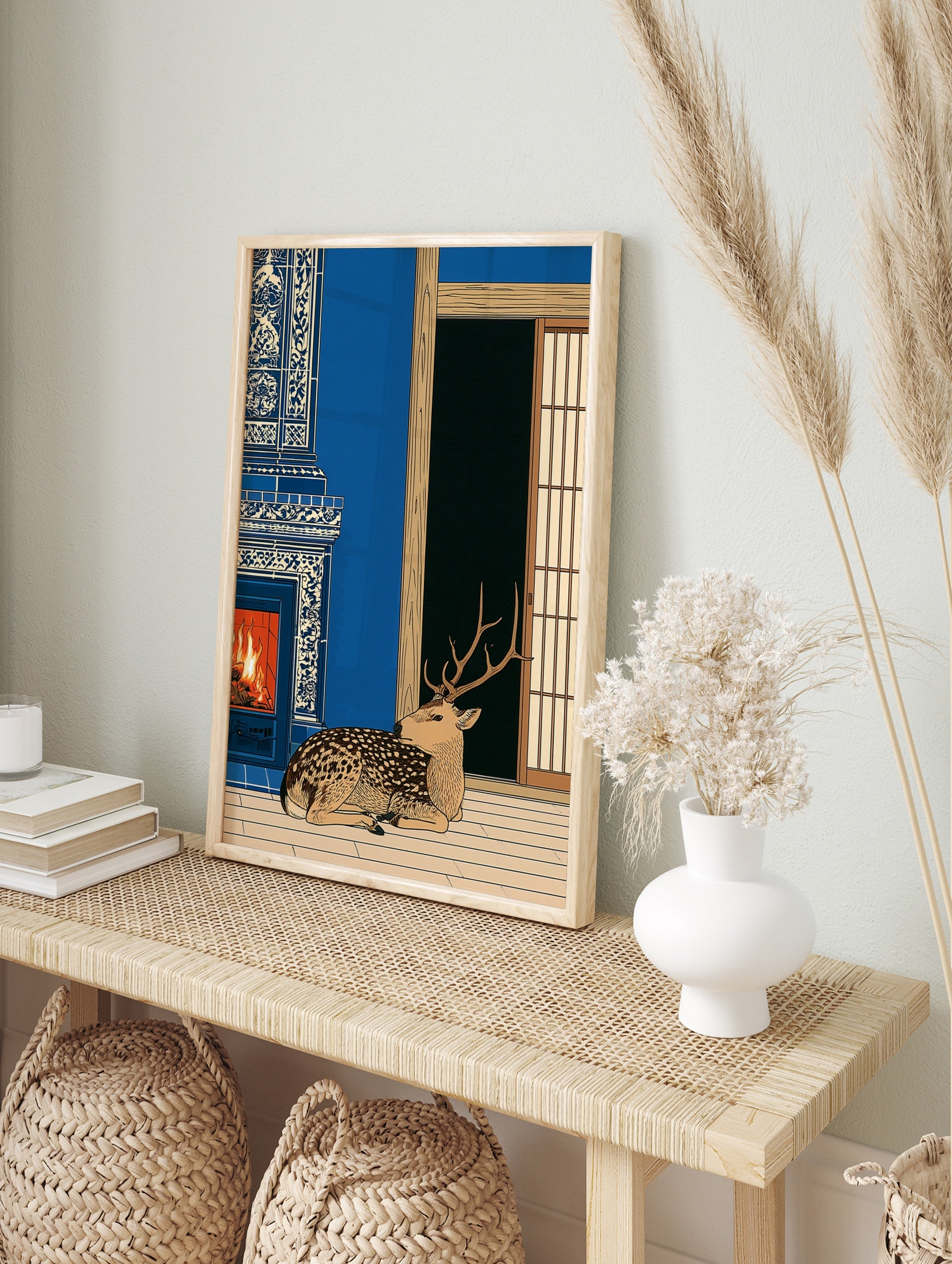 Spotted deer resting by a blue and white tiled fireplace in a traditional Japanese-style, in an alternate framed mockup