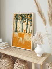 Woodcut style illustration of an orange deer in a dark green forest clearing with tall trees, in an alternate framed mockup