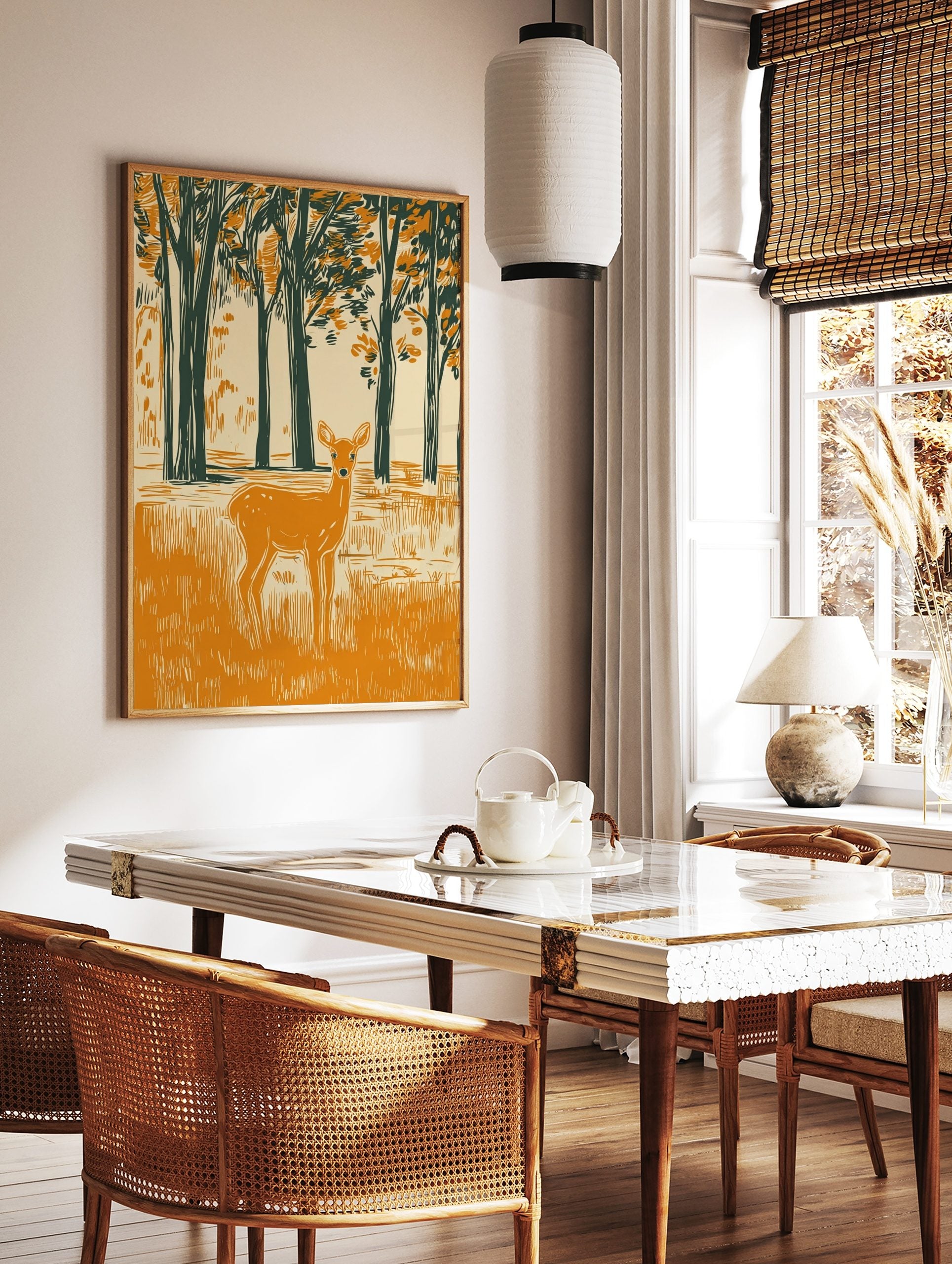 Woodcut style illustration of an orange deer in a dark green forest clearing with tall trees, in a styled room mockup