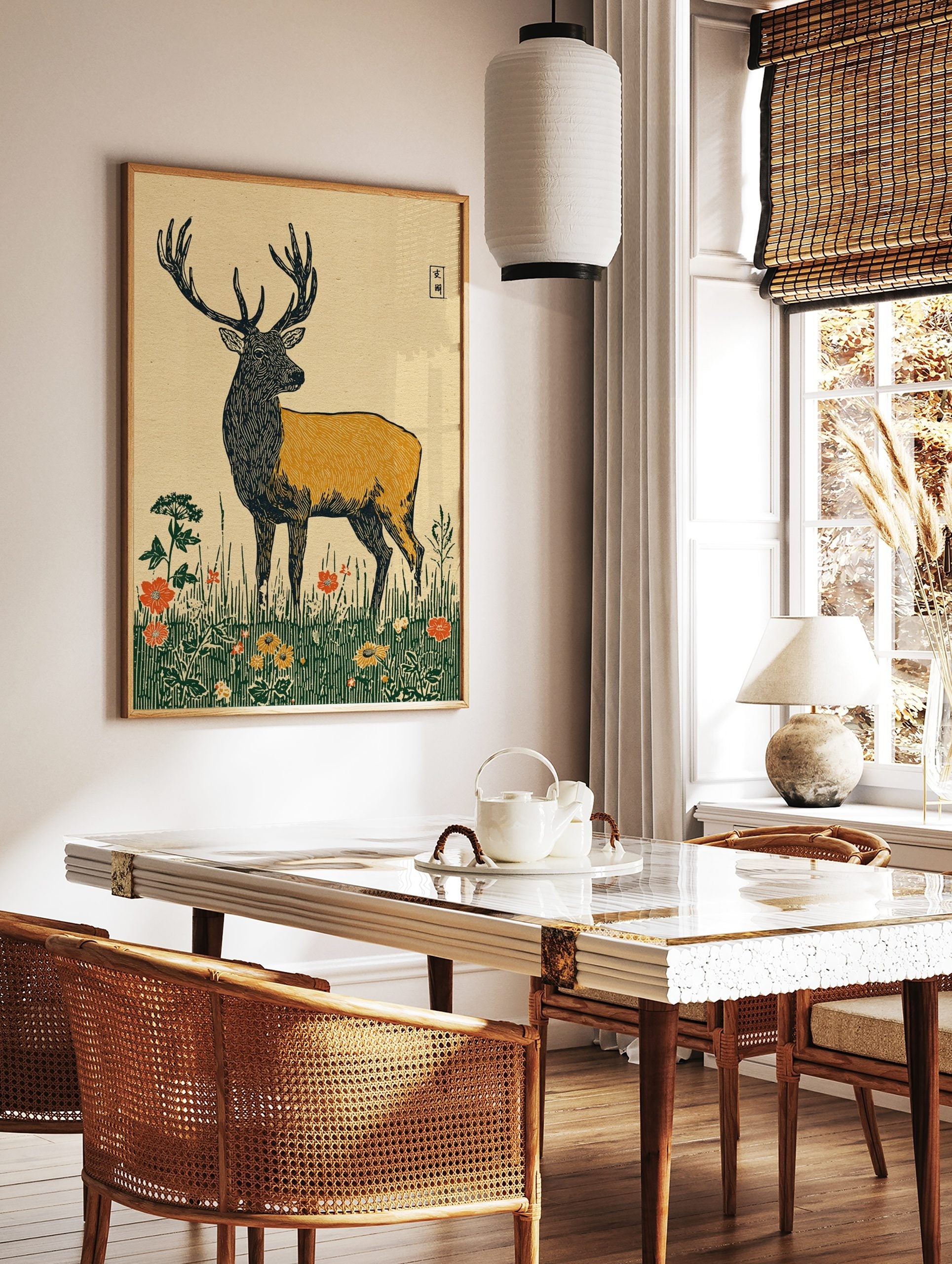 Illustrative stag deer wall art print in a meadow with red and yellow flowers and Japanese-style, in a styled room mockup