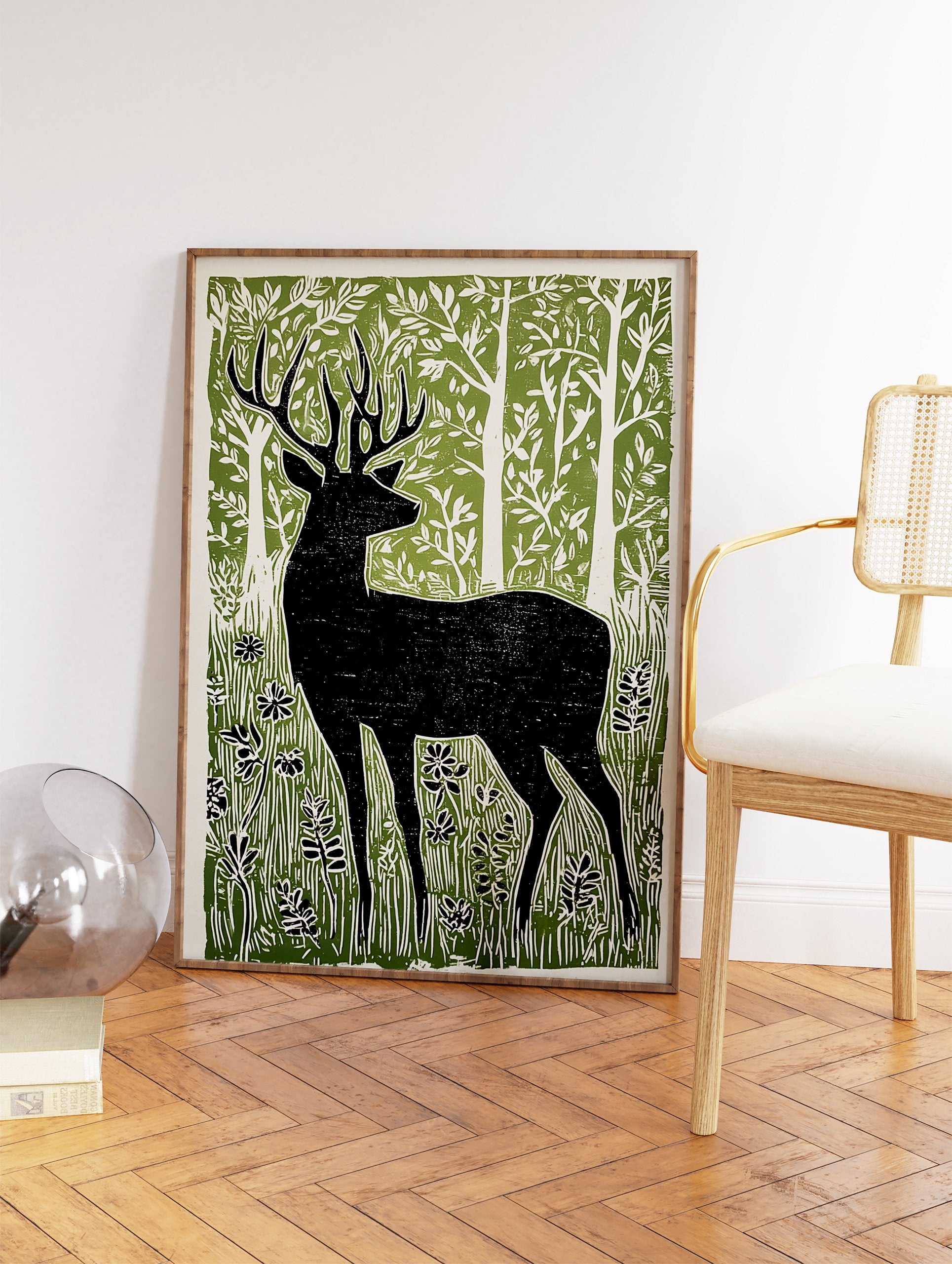 Black deer silhouette linocut print in a green forest with white trees and foliage, on a light background. - Image 2