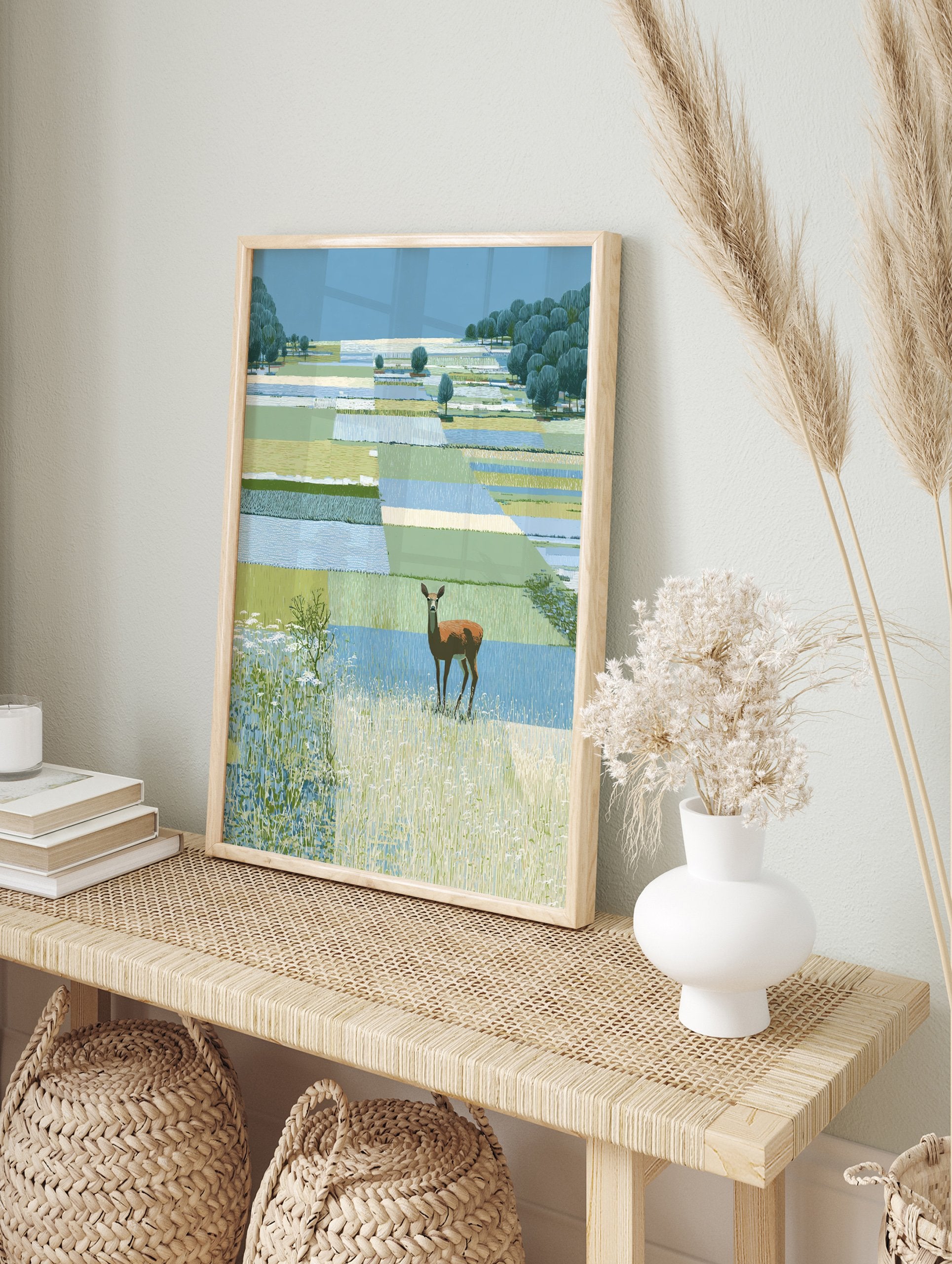 Deer wall art illustration of a brown deer in a green and blue patchwork landscape with trees and tall grass. - Image 3