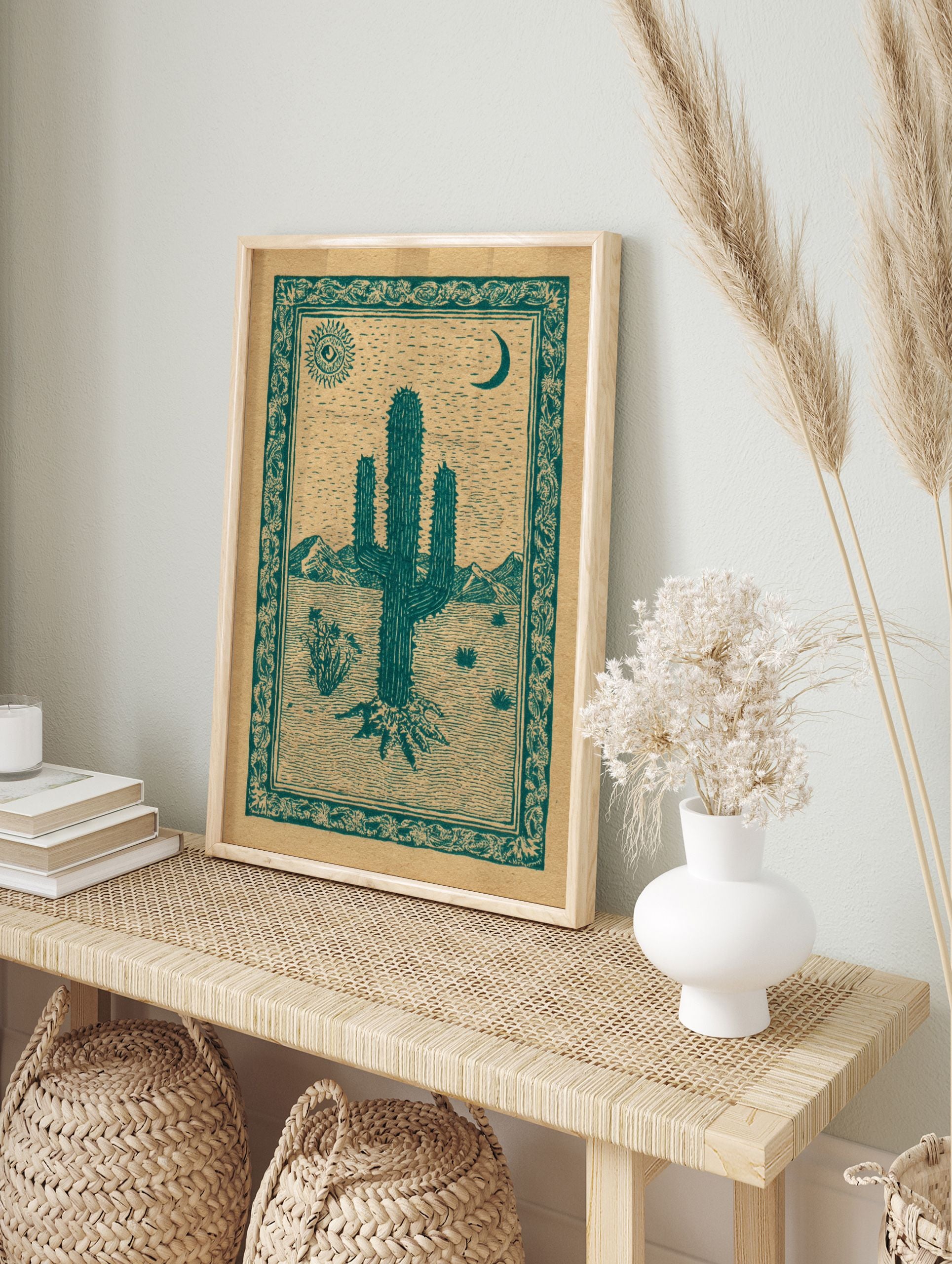 Desert cactus poster with a green illustration of a saguaro, sun with an eye, and crescent moon in a desert landscape. - Image 4
