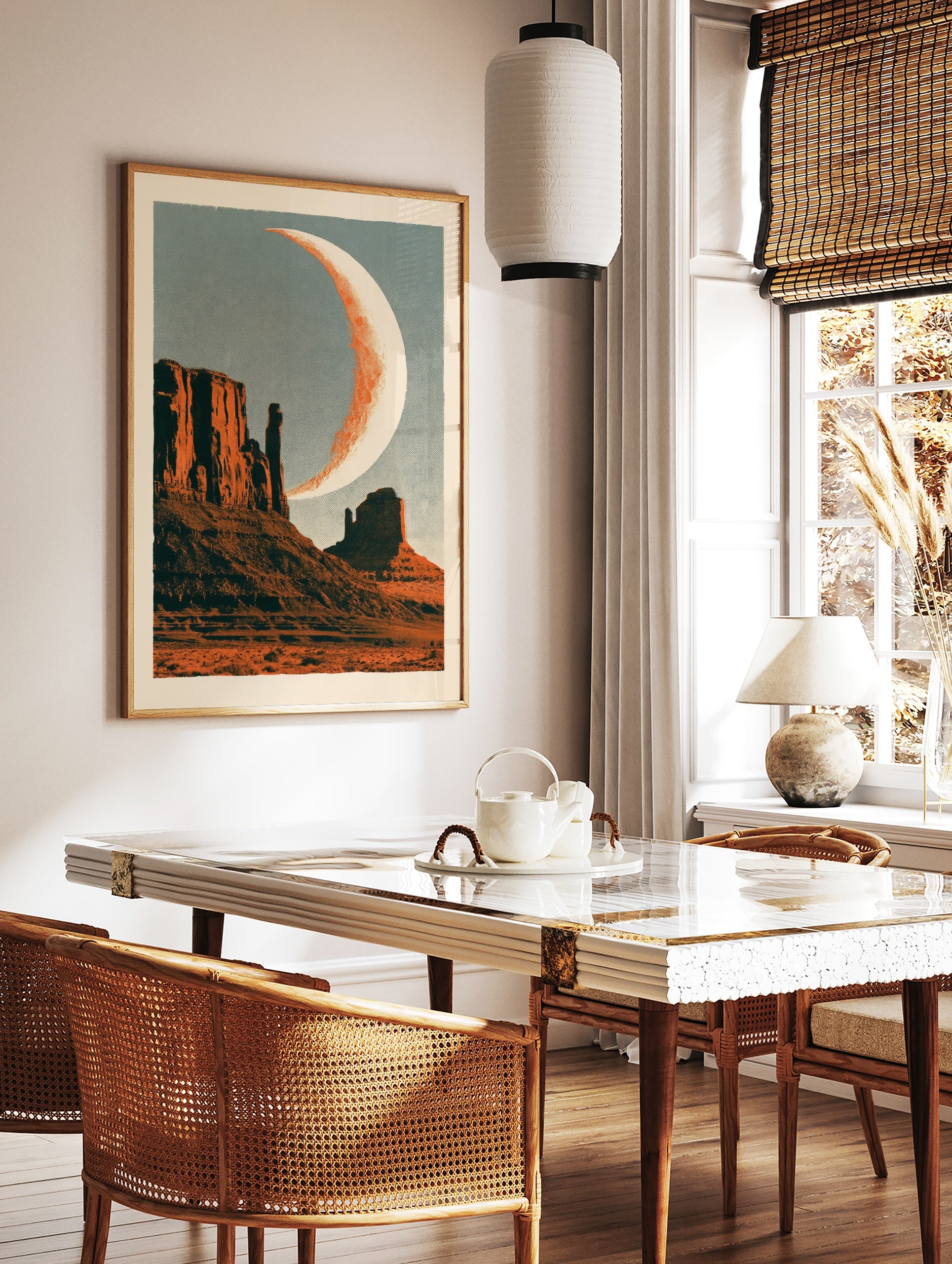 Retro desert landscape wall art featuring mesas and a crescent moon with halftone texture, in a styled room mockup