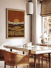 Desert Sun Linocut Poster depicting a sunset/sunrise over a vast landscape with mountains, clouds, and a path through grass. - Image 2
