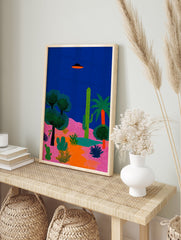 Vibrant Desert UFO poster with a black and orange flying saucer over pink hills and green cacti under a dark blue sky. - Image 4