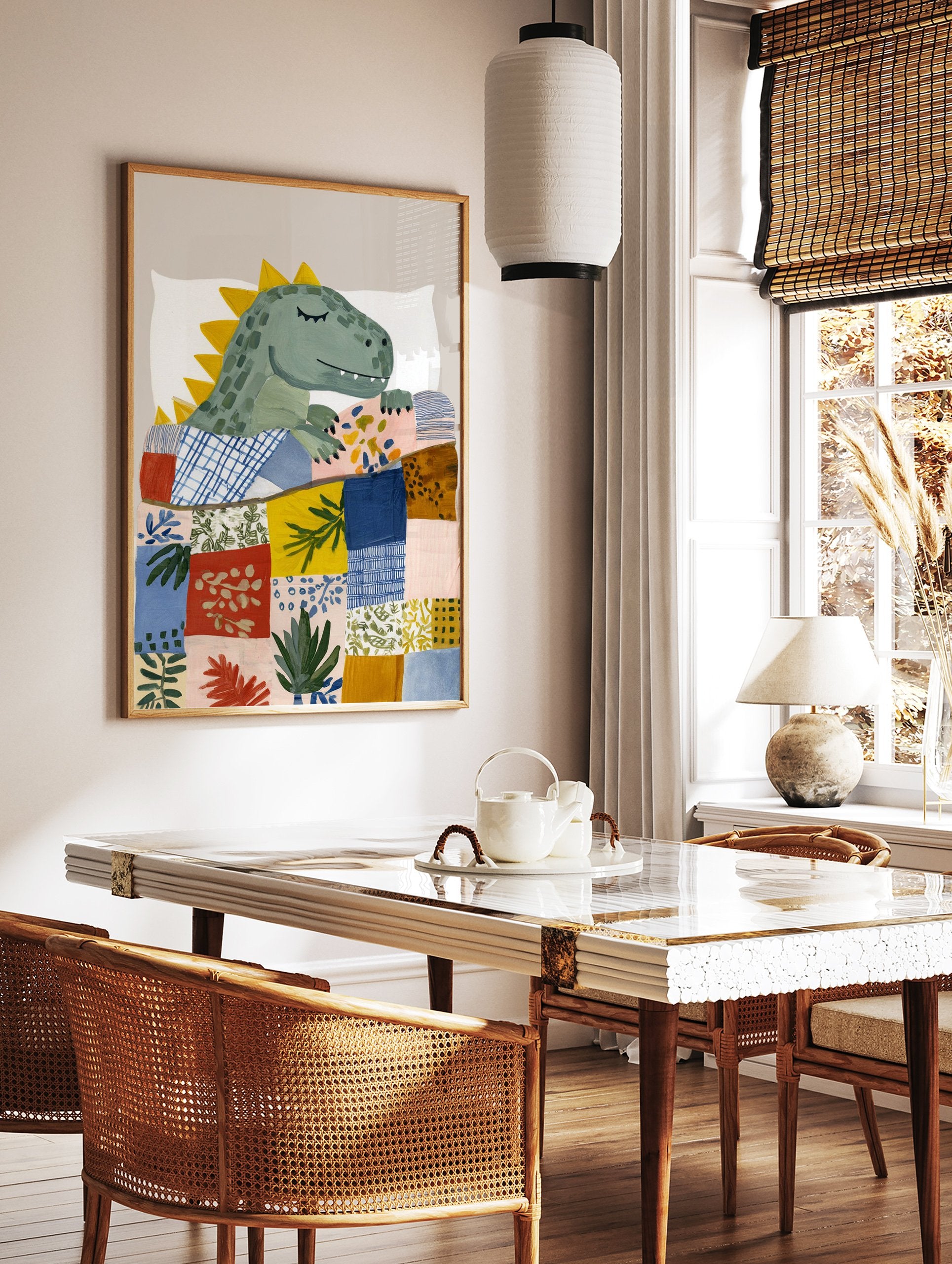 Dinosaur wall art print showing a cute sleeping green dinosaur under a colorful patchwork quilt on a white pillow. - Image 2