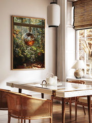 Illustrative print of a shiny disco ball among green and orange plants in a sunlit conservatory with windows, in a styled