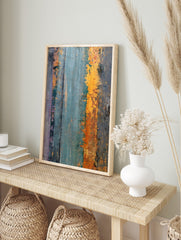 Abstract wall art with distressed vertical stripes in teal, orange, grey, and purple textured, in an alternate framed mockup