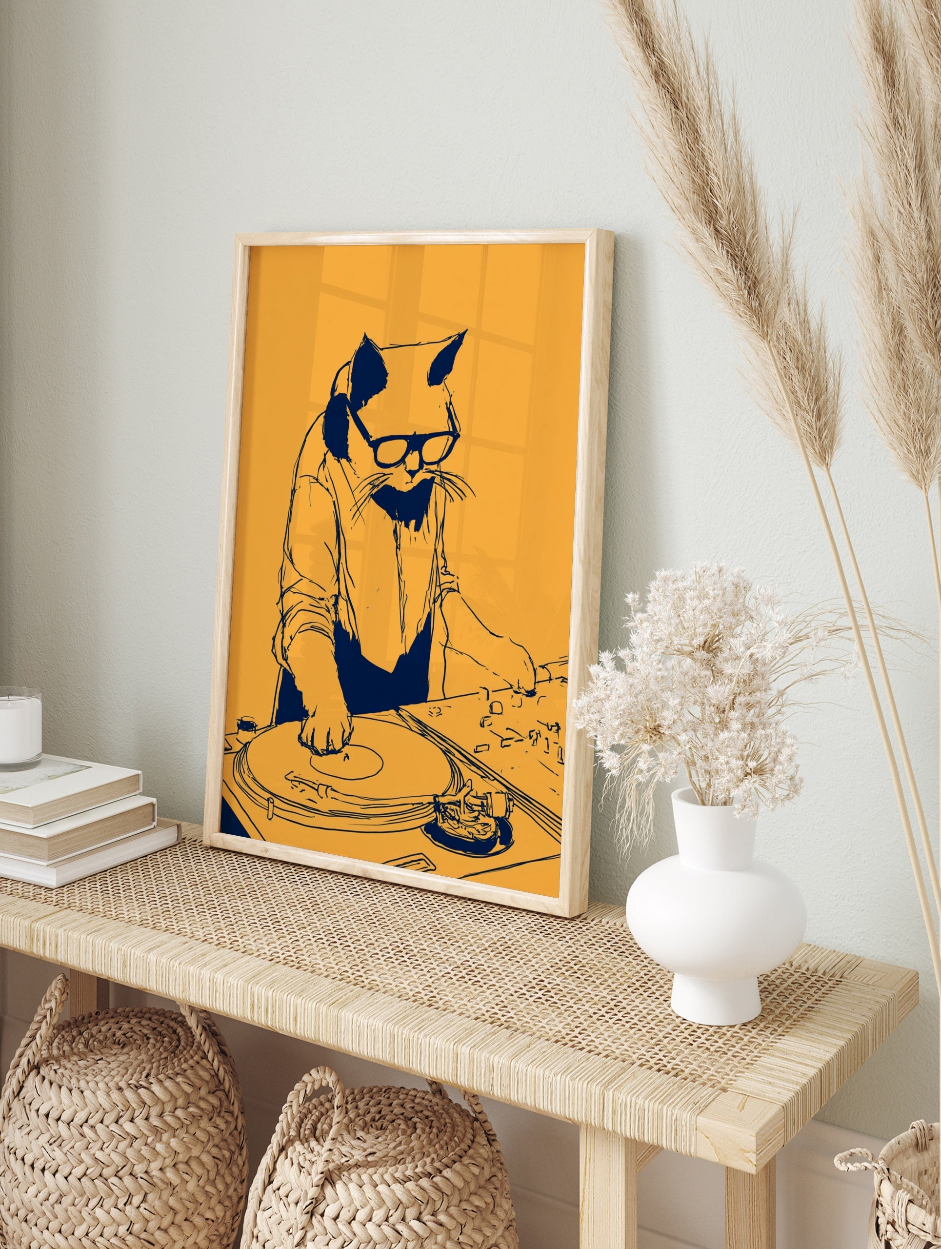 Stylized DJ cat illustration wearing glasses and headphones, spinning vinyl on a turntable, in an alternate framed mockup