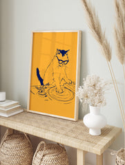 Stylised blue line illustration of a cat wearing glasses DJing on turntables against a solid, in an alternate framed mockup