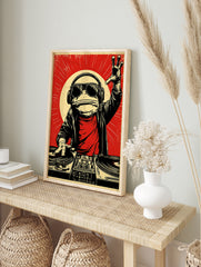 Illustrative DJ frog wearing headphones and sunglasses at a turntable, red background, retro, in an alternate framed mockup