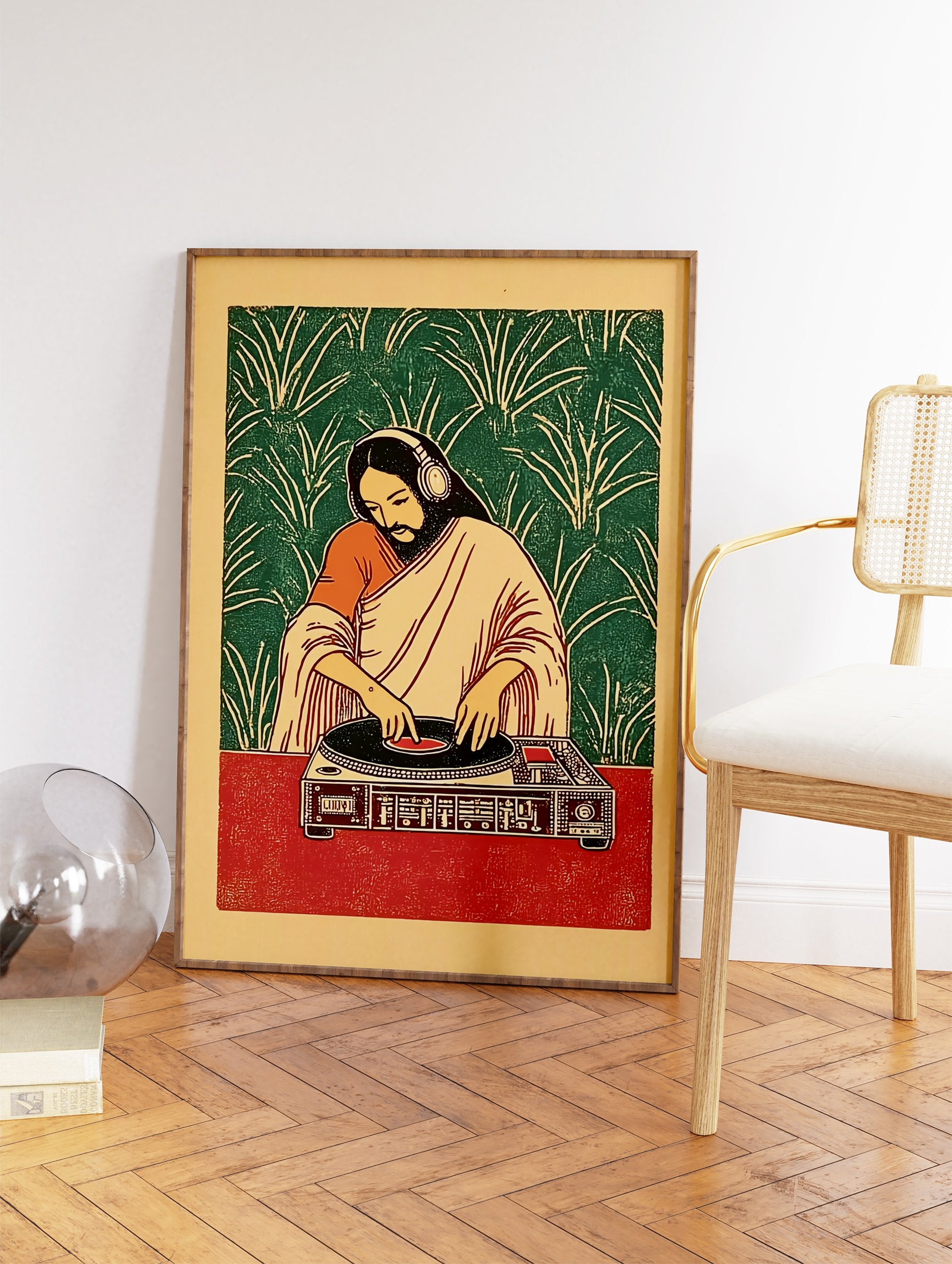 Illustrative DJ Jesus poster in Indian attire with headphones mixing on a turntable against a green leaf pattern background. - Image 2
