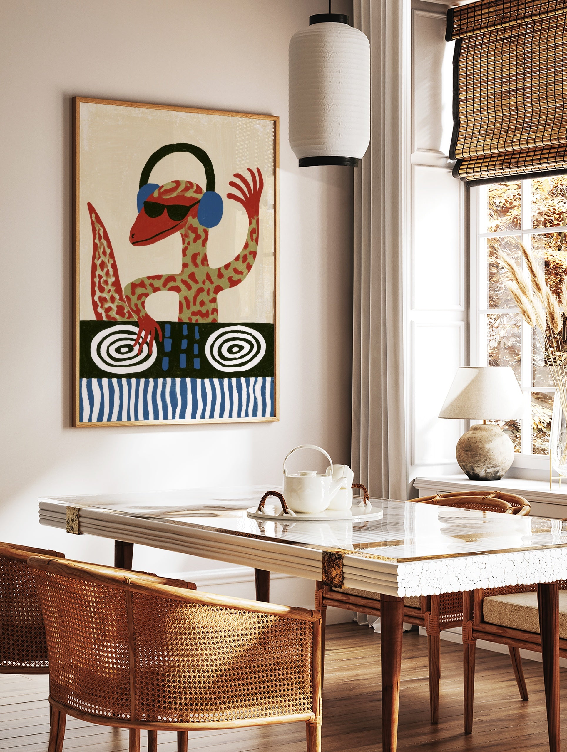A red gecko DJ wearing headphones and sunglasses at a turntable, illustrative wall art print on a, in a styled room mockup