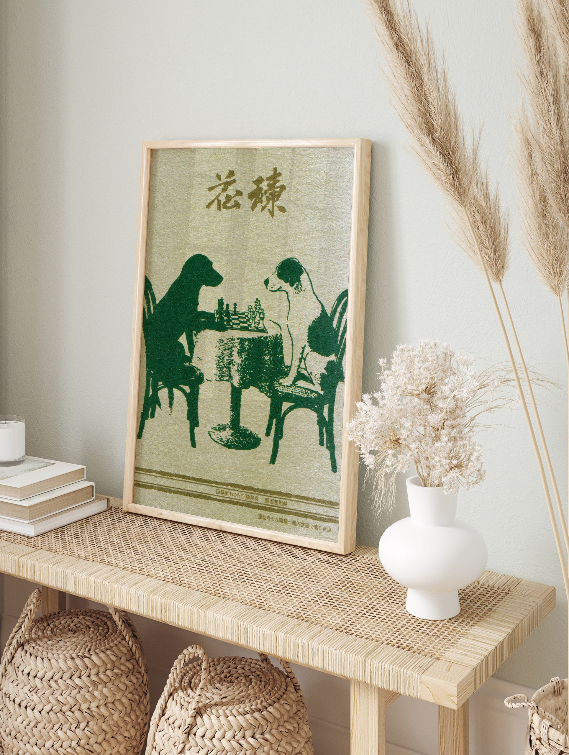Illustrative art print of two dogs playing chess, one a green silhouette and the other, in an alternate framed mockup