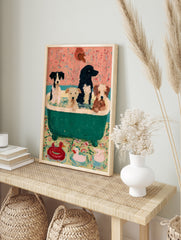 Four dogs in a green bathtub with toy ducks on the floor, painterly style art print on pink, in an alternate framed mockup