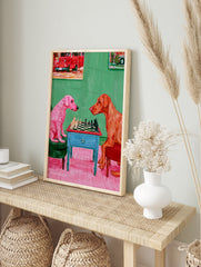 Impressionist illustration of a pink dog and a ginger dog playing chess on a blue table, in an alternate framed mockup
