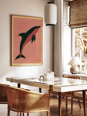 Minimalist dolphin illustration art print with dark green and pink colours on a beige background, in a styled room mockup