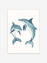 Two blue watercolour dolphins, one large and one small, in dynamic swimming poses on a white background