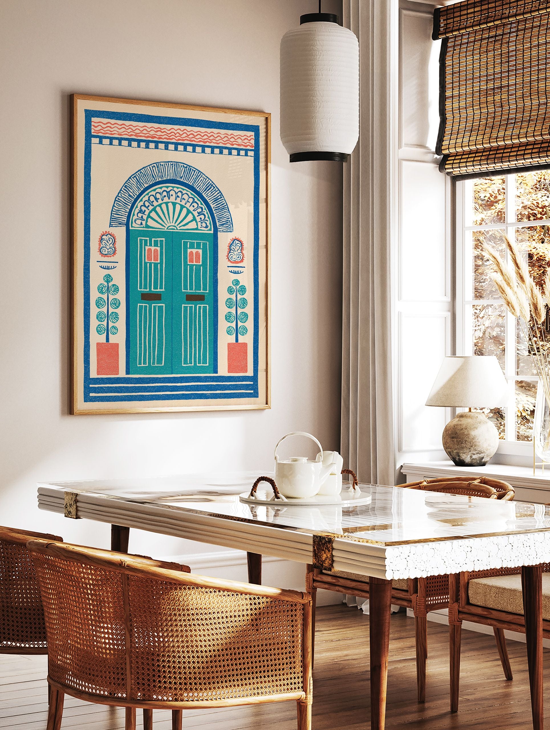 Illustrative doorway wall art print with an arched blue door, red accents, and potted plants on a cream background, folk art style. - Image 2